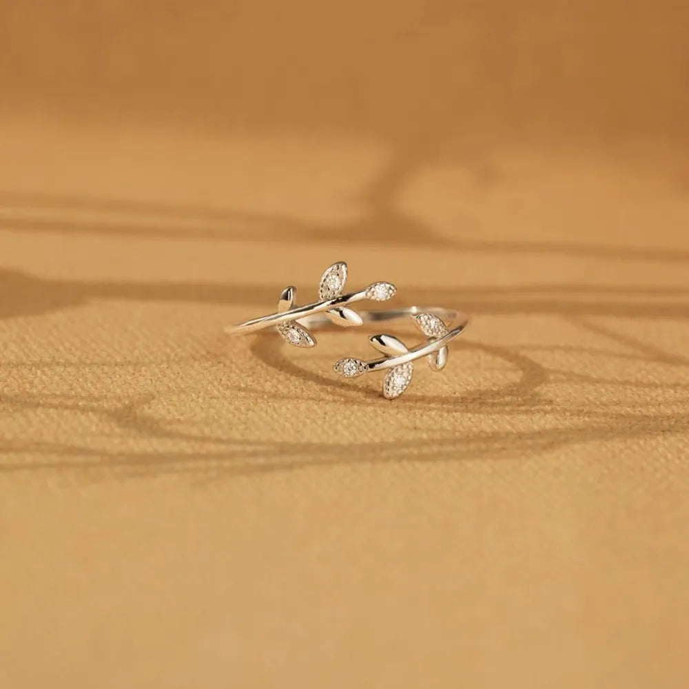 Silver branching zirconia vine ring with delicate leaf details.