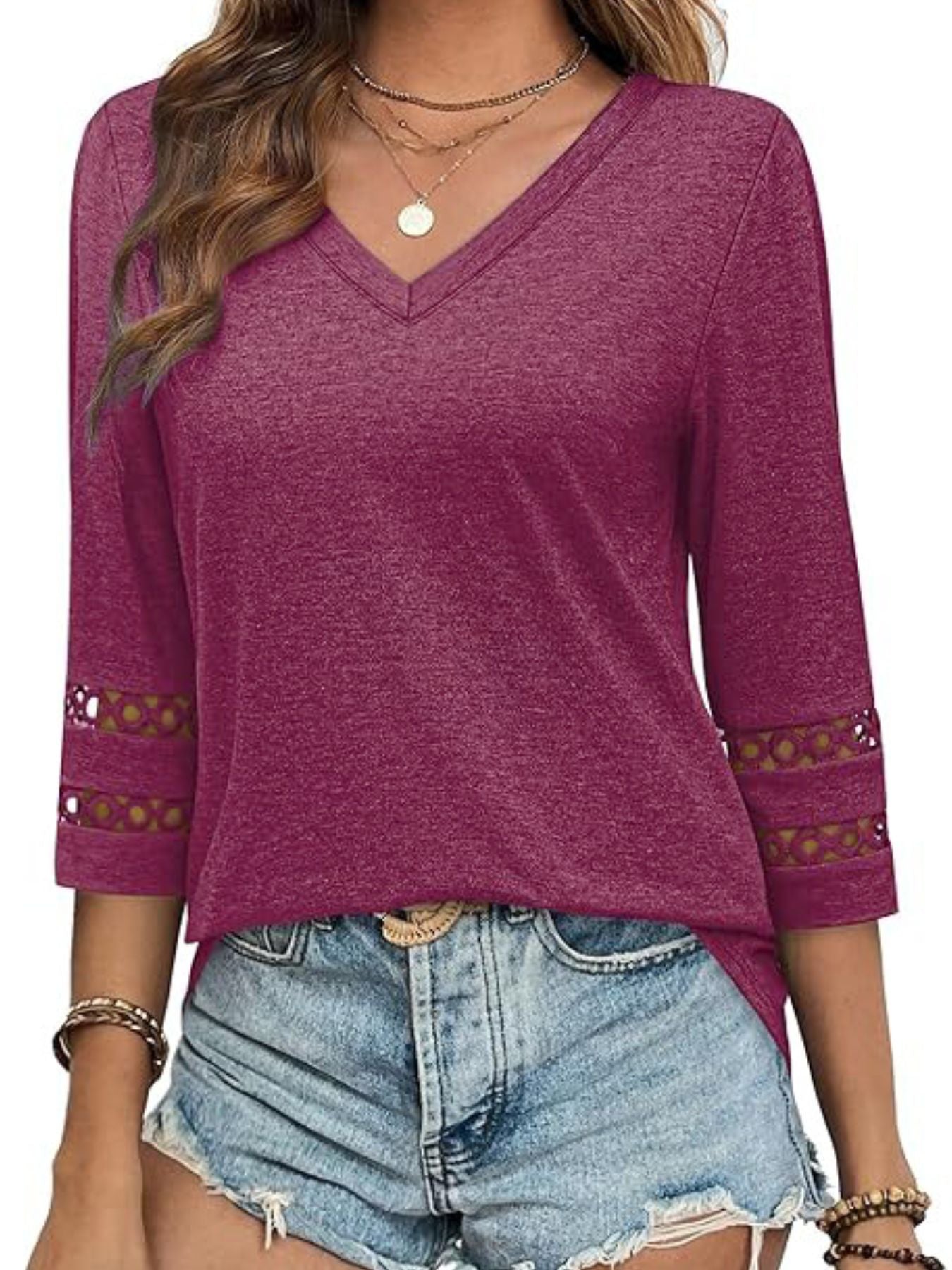 Burgundy 3/4 sleeve v-neck t-shirt with cutout detail on sleeves.