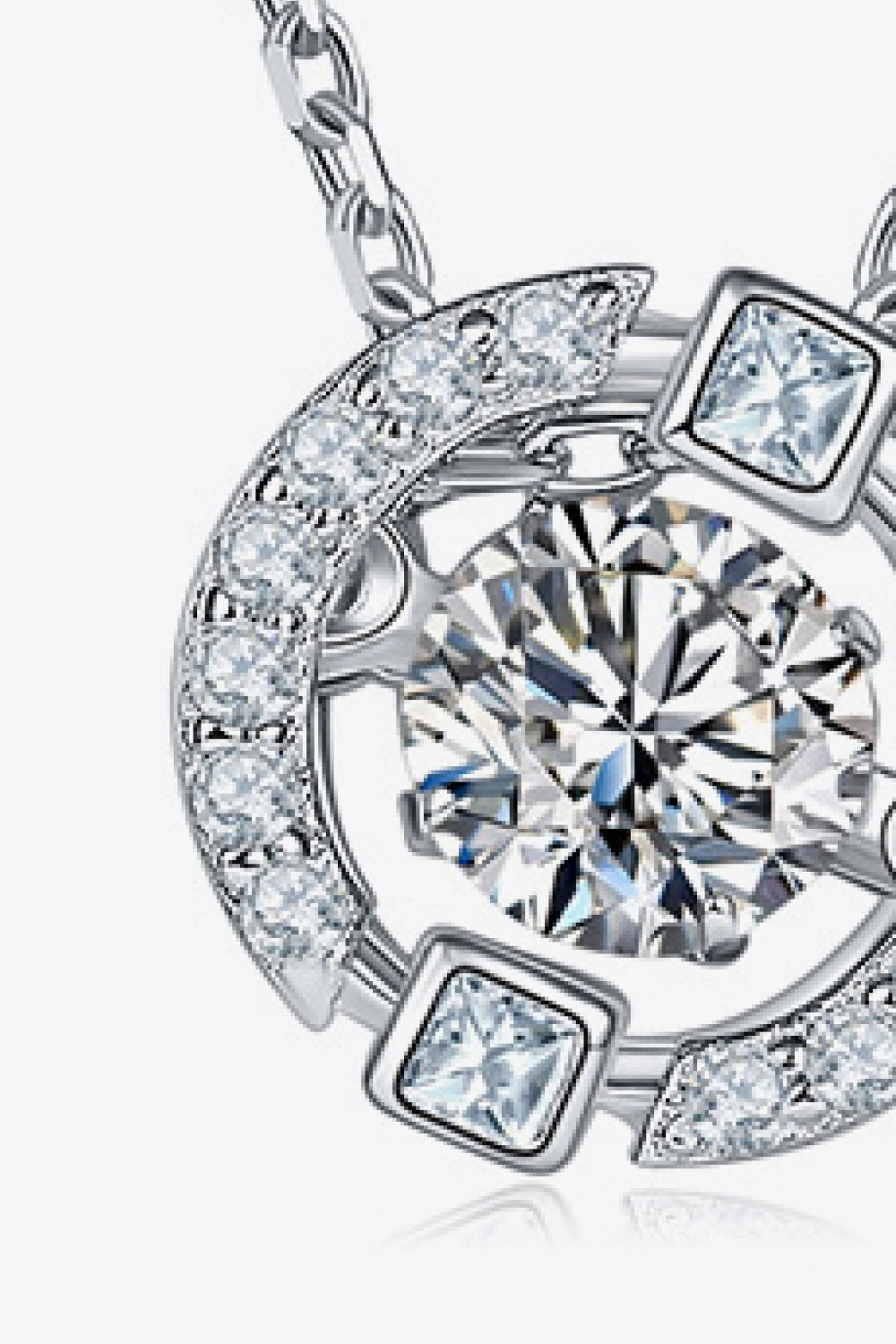 Silver necklace with orbital moissanite and square accent stones.
