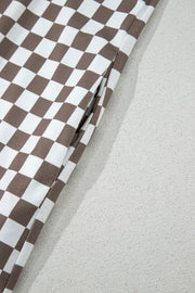 Checkered palazzo jumpsuit in mocha with a visible side pocket detail.