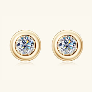 Gold bezel-set crystal stud earrings with D color grade clear stones.