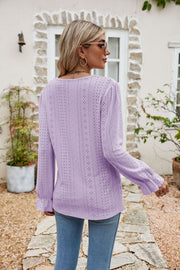 Lavender eyelet lace blouse with ruffle sleeves and a casual cut.