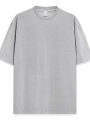 Oversized gray pigment-dyed crewneck t-shirt with short sleeves and a relaxed fit.