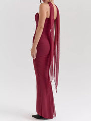 Burgundy ruched sweetheart neckline maxi dress with flowing sheer sleeves.