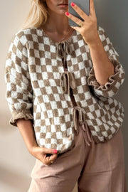 Checkered tie-front knit cardigan with ruffle sleeves in taupe and white