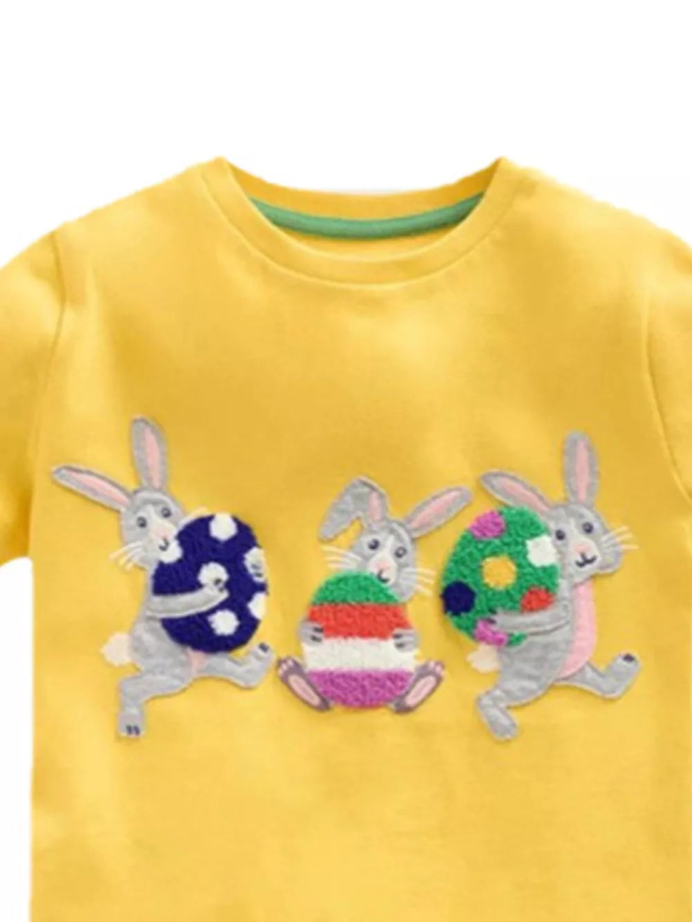 Yellow cotton blend t-shirt with embroidered bunnies and Easter eggs.