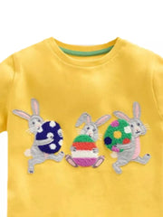 Yellow cotton blend t-shirt with embroidered bunnies and Easter eggs.