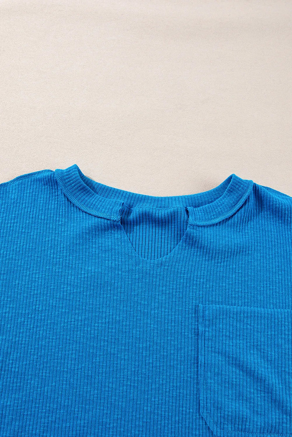 Sky blue ribbed thermal top with cutout neckline and chest pocket