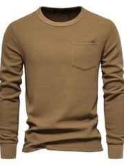 Caramel textured thermal long sleeve tee with crew neck and chest pocket detail.