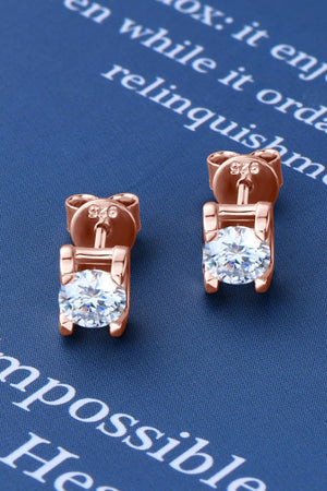 Rose gold moissanite solitaire stud earrings with 925 stamp detail.