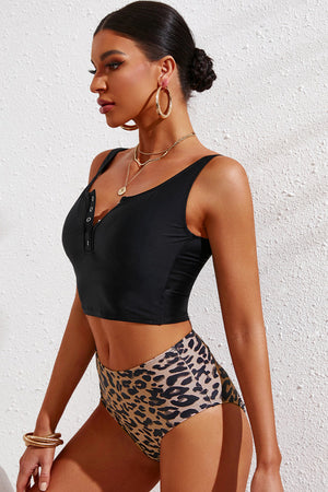 Black button-front tankini top with leopard print high-waist bottoms