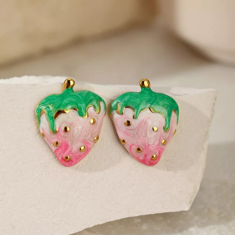 18k gold strawberry charm earrings with pink and green enamel and gold details