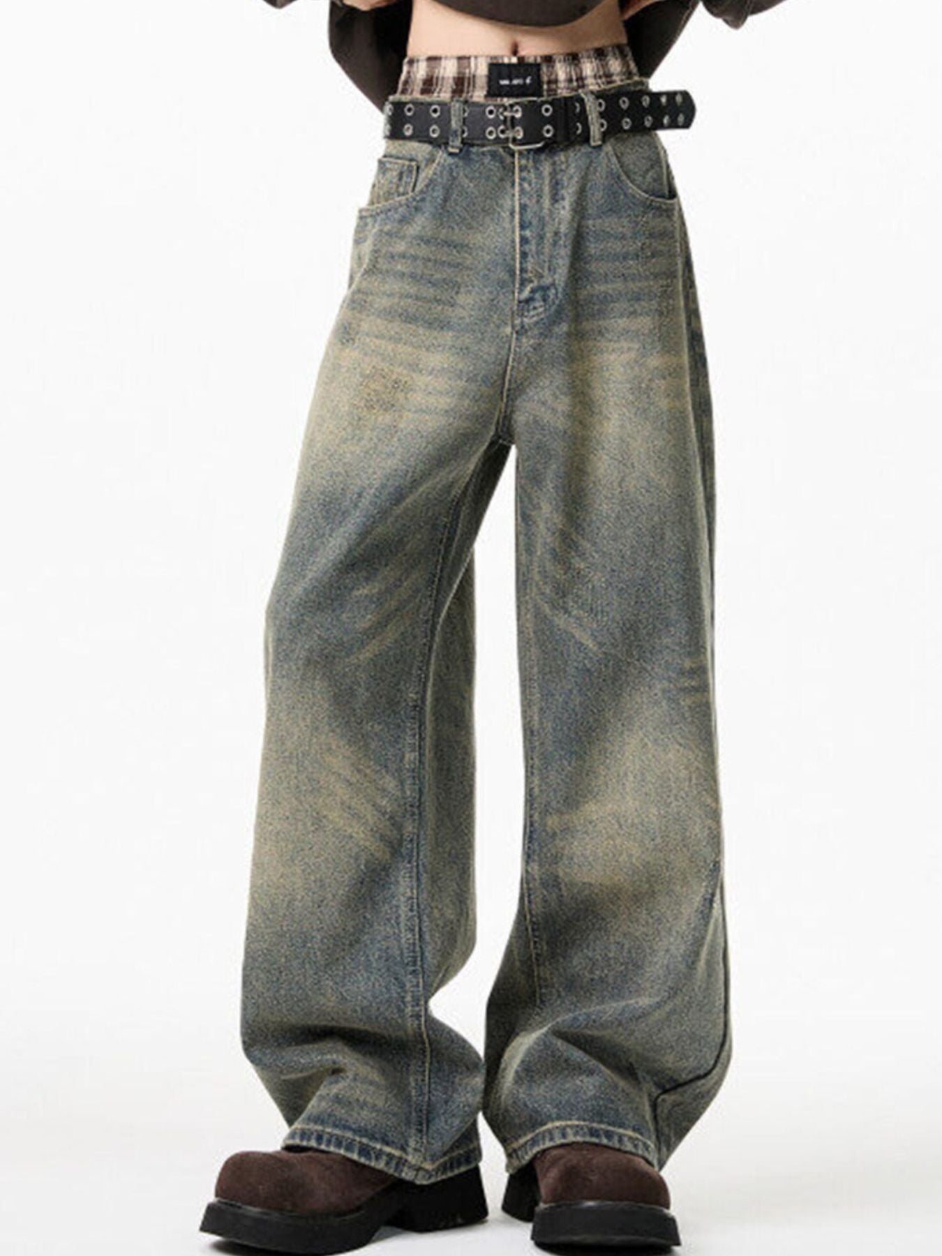 Men's belted wide-leg jeans in distressed blue cotton denim with a relaxed fit.