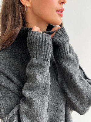 Oversized turtleneck lounge knit sweater in Dark Gray acrylic with ribbed cuffs and neckline.