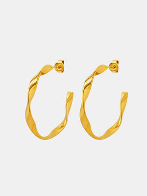 Gold twisted hoop earrings with a sculpted design.