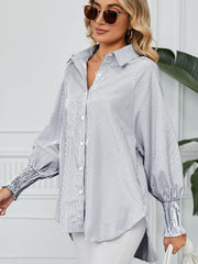 Stripe button-up shirt with balloon sleeves and smocked cuffs.