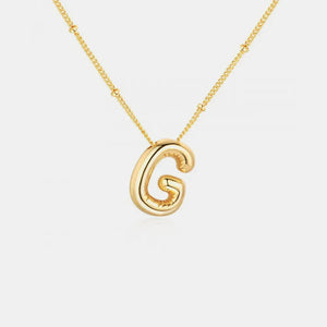 Gold initial pendant necklace with bubble letter G and beaded chain