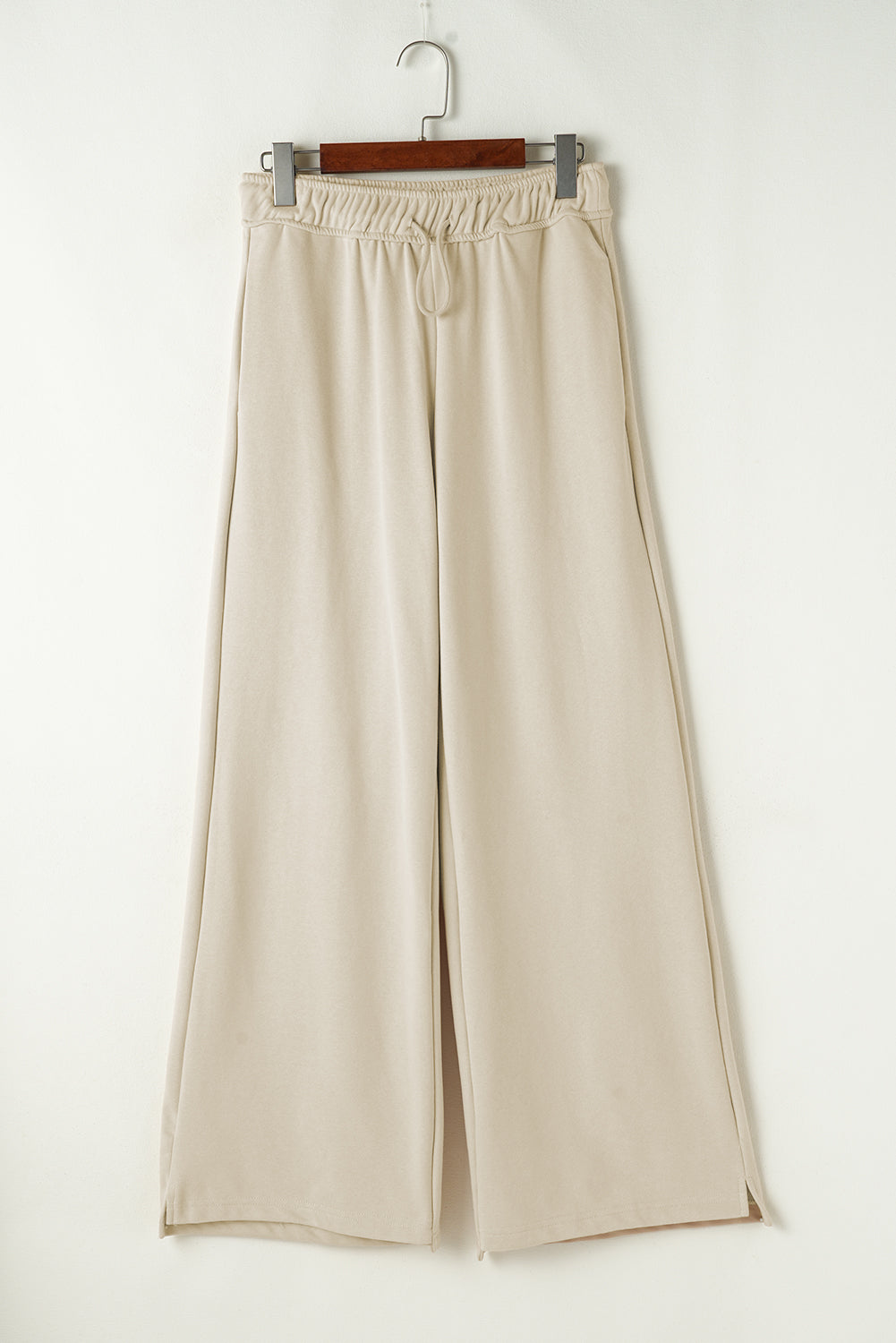 Beige wide-leg drawstring lounge pants with side slits