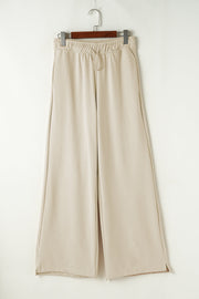 Beige wide-leg drawstring lounge pants with side slits