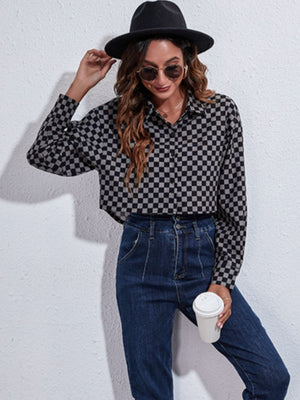 Checkerboard cropped shirt jacket in black and gray with button front and collar.