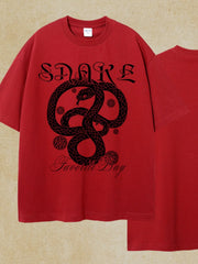 Red oversized t-shirt with black snake graphic and text.