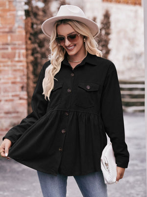 Black corduroy peplum shirt jacket with button front and chest pockets.