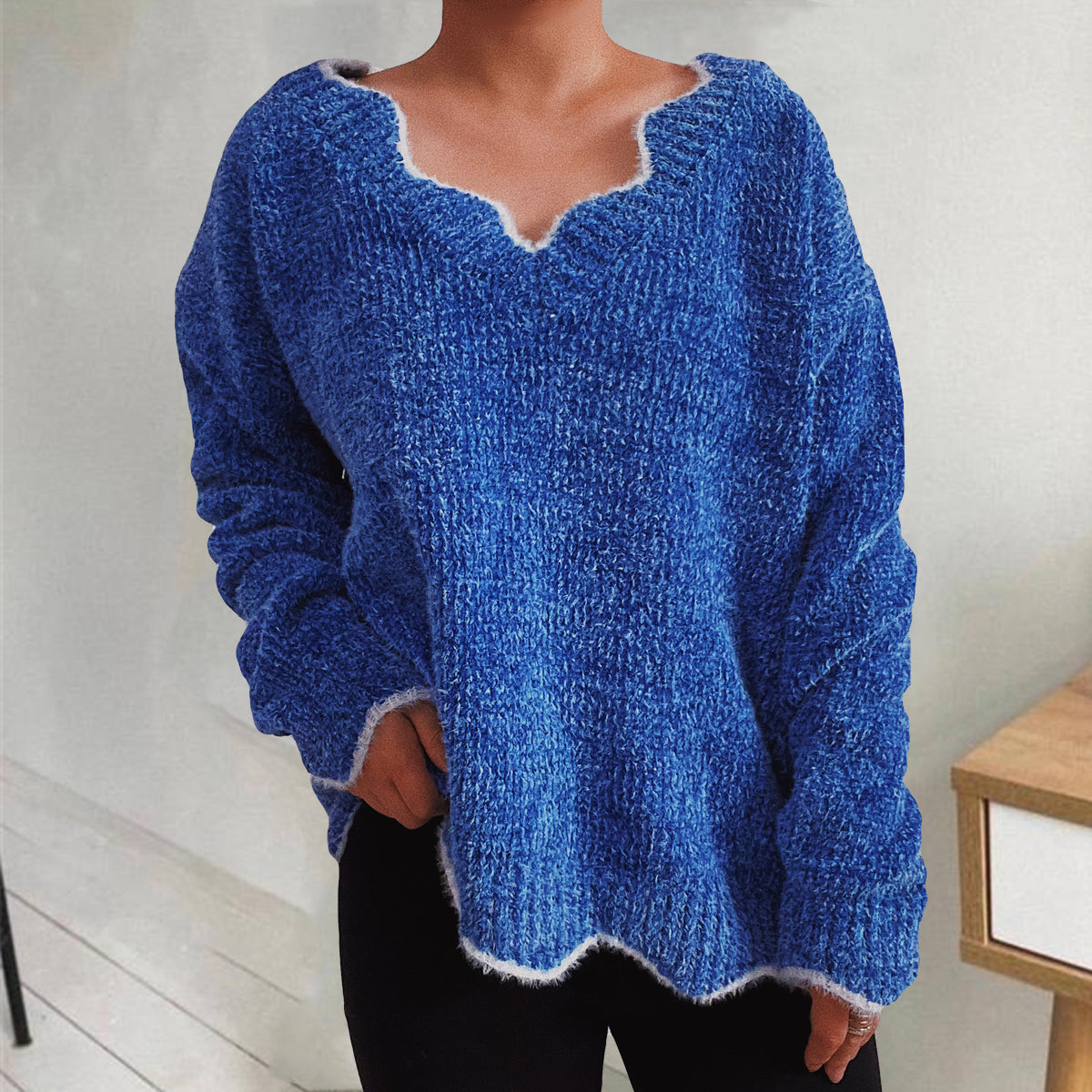 Royal blue acrylic knit sweater with scalloped trim and V-neck