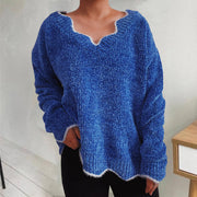 Royal blue acrylic knit sweater with scalloped trim and V-neck