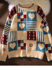 Men's cream sweater with heart and checkered patchwork pattern, crew neck, long sleeves.