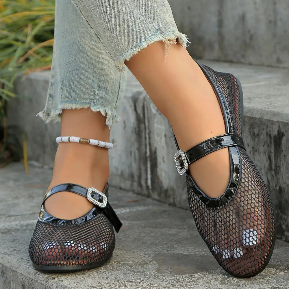 Black mesh ballet flats with patent trim and buckle detail