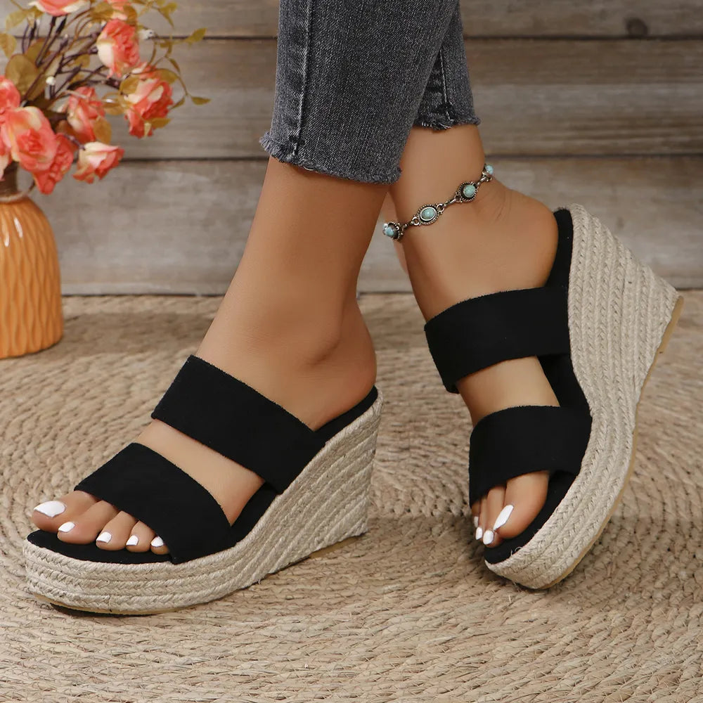 Black rope-wrapped platform slides with double band straps.