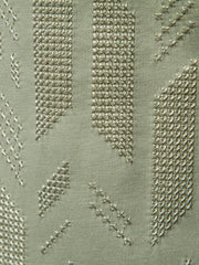 Embossed geometric tee in gum leaf green with textured stitching details.