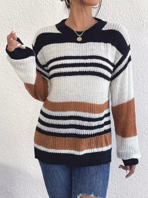 Casual striped knit sweater with color block accents in black, white, and beige acrylic.