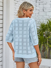 Light blue openwork box stitch knit top with puff sleeves and a relaxed fit.