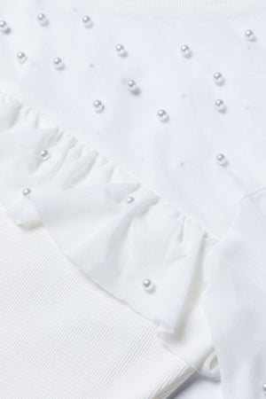 White mesh yoke bodysuit with pearl embellishments and ruffled trim