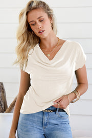 Ivory cowl neck cap-sleeve tee with a relaxed fit.