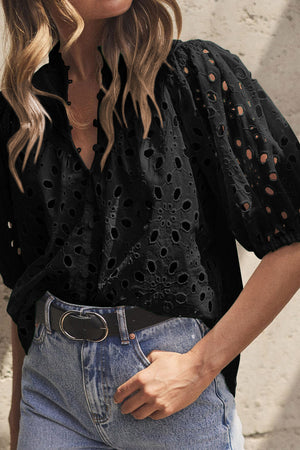 Black eyelet puff-sleeve blouse with stand collar and button detail