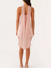 Blush pink cherry print strapless mini dress with a handkerchief hem and tie back detail.