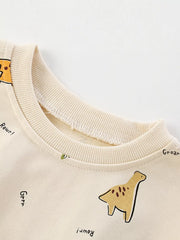 Beige cotton crew neck sweatshirt with dinosaur print and text details.