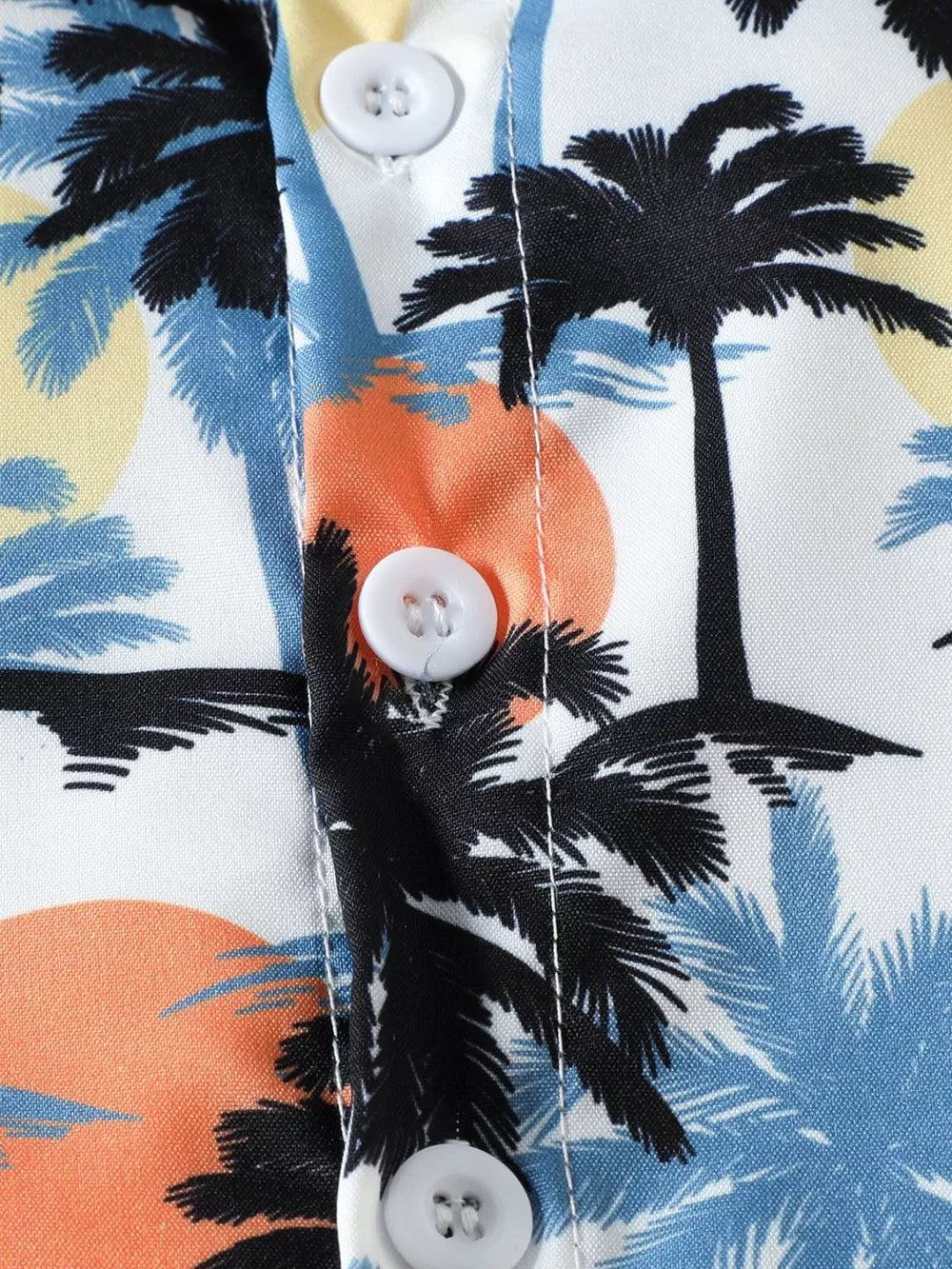 Baby cotton shirt with multicolor palm tree and sunset print, featuring white buttons.