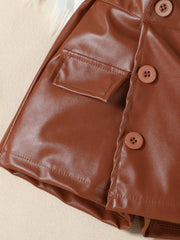 Brown faux leather baby girls' skort with decorative button and pocket detail.