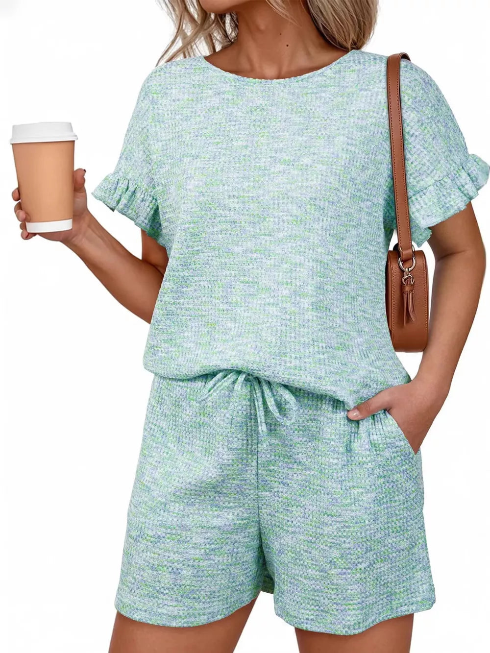 Green and blue marled knit two-piece set with ruffled short sleeves and drawstring shorts.