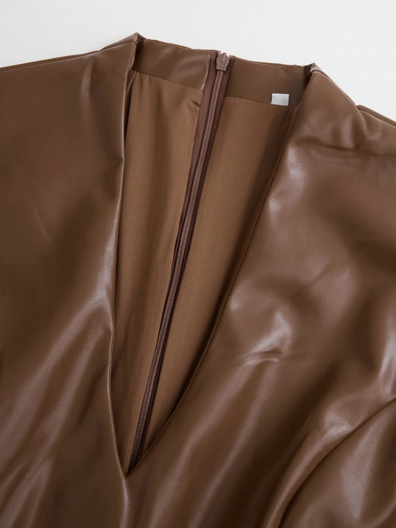 Brown leather V-neck midi dress with zipper detail