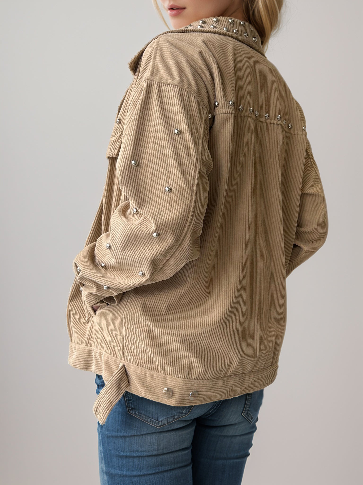 Tan corduroy overshirt with relaxed fit and studded collar and sleeves