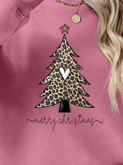 Blush pink sweatshirt with leopard print Christmas tree graphic and Merry Christmas text.