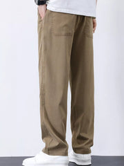 Relaxed fit camel cargo pants with back pockets and side seam detail.