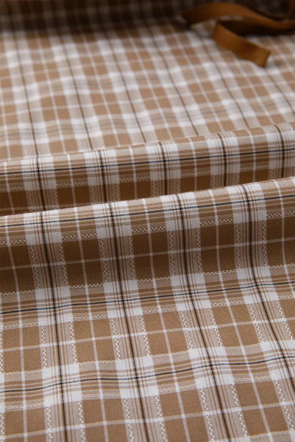 Plaid print casual pants in camel and white with drawstring detail