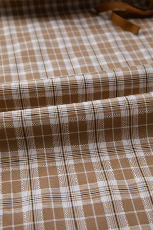 Plaid print casual pants in camel and white with drawstring detail