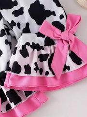 Children's Cow Print Ruffle Jumpsuit in Brown And White, back view
