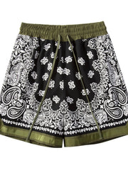 Black bandana print sport shorts with metallic trim and olive green waistband.
